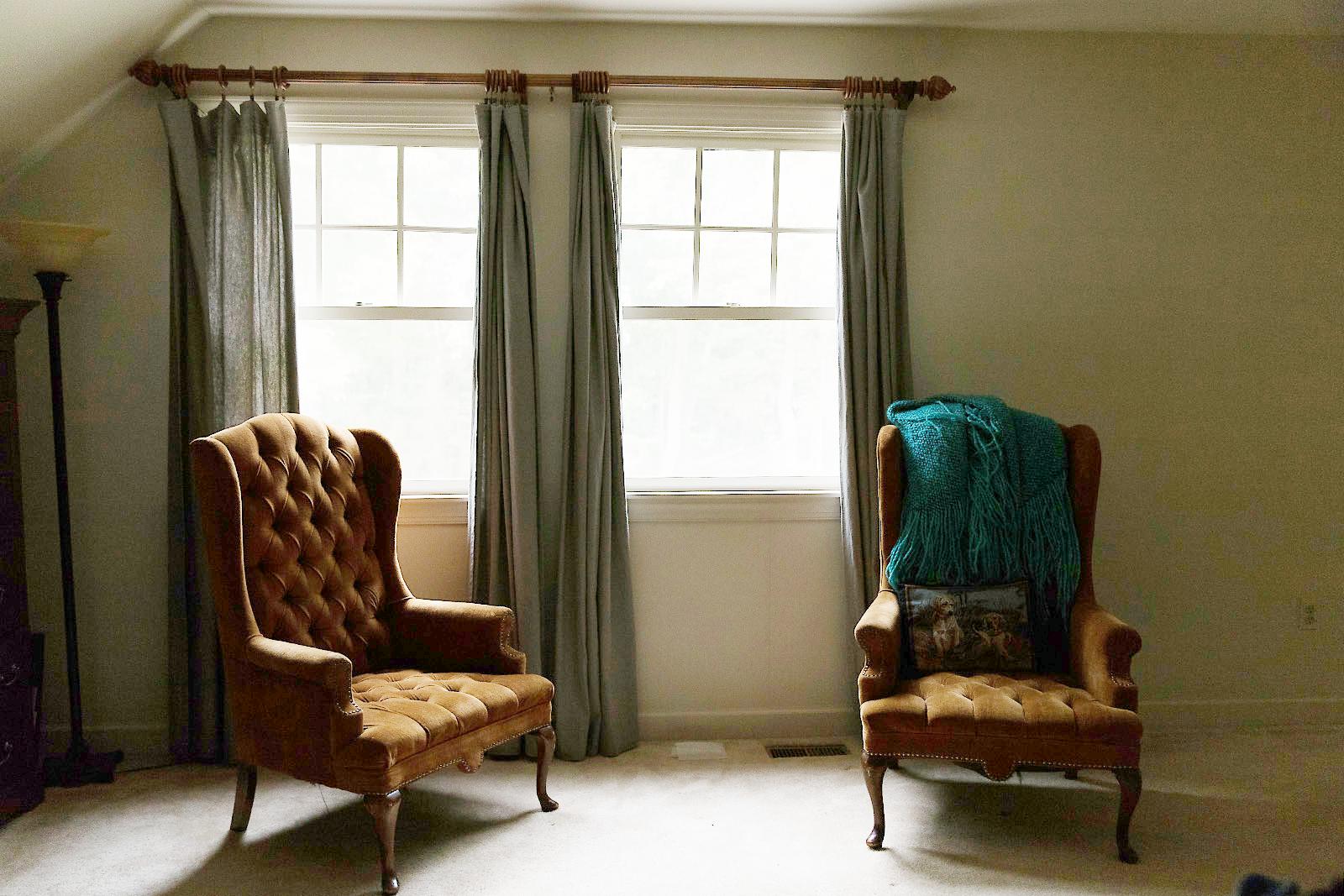 Zero-DCE Lite enhanced image revealing two chairs and curtains in a room